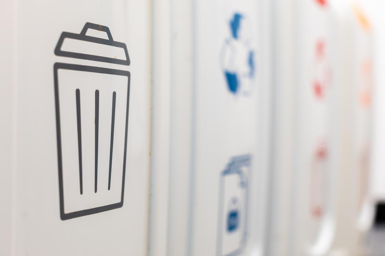 Close up of the symbols on rubbish/waste bins